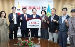 중앙시장활성화구역 상인회 ‘0시 축제 수익’ 600만 원 장학금 기탁